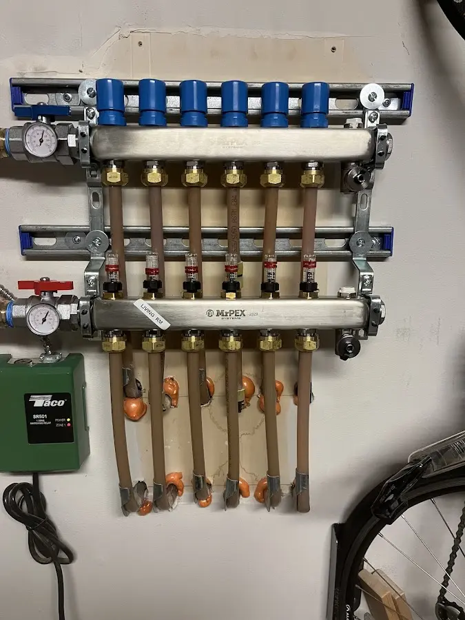 Plumber performing Water Heater Repair at a residential property in La Riviera